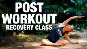 Class thumbnail: Post Workout Recovery Class, woman in a seated side stretch