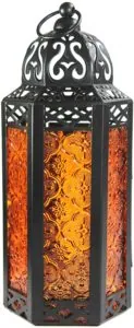 Ornate black and amber glass lantern
