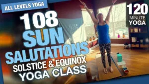 108 Sun Salutations solstice and equinox yoga class, 120 minutes, teacher standing in a studio