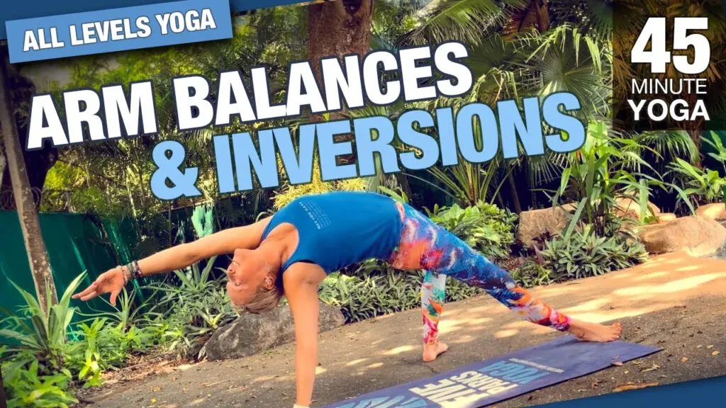 Arm balances and inversions, 45 minute yoga class, woman in a pose on a mat outdoors