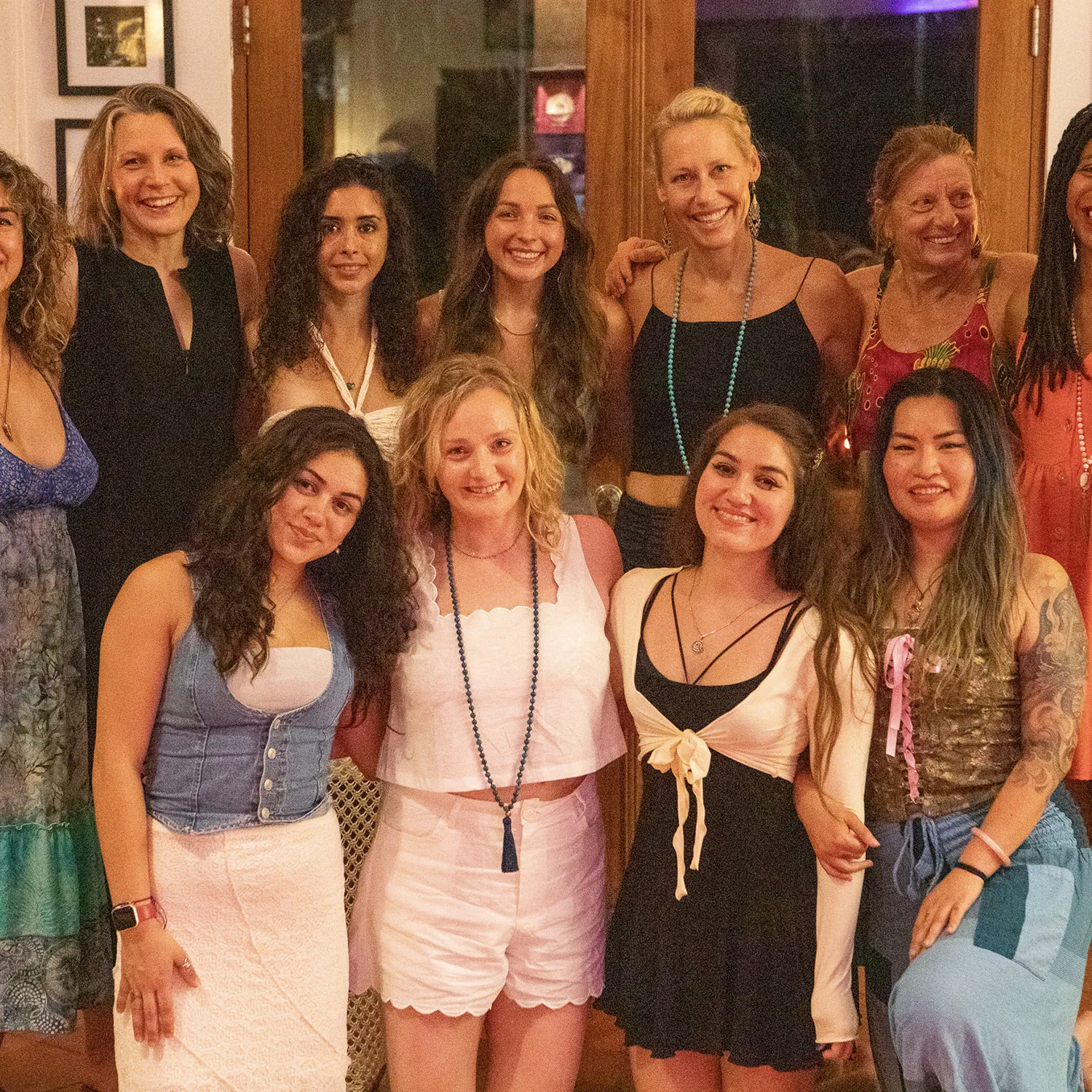 Group portrait of smiling teacher training students and teachers
